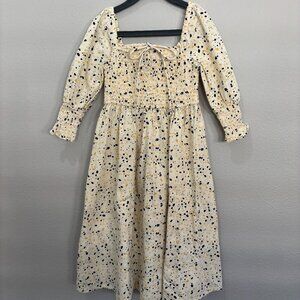 Feather Drum cream with dots maxi dress, smocked top and cuffs, bow in front